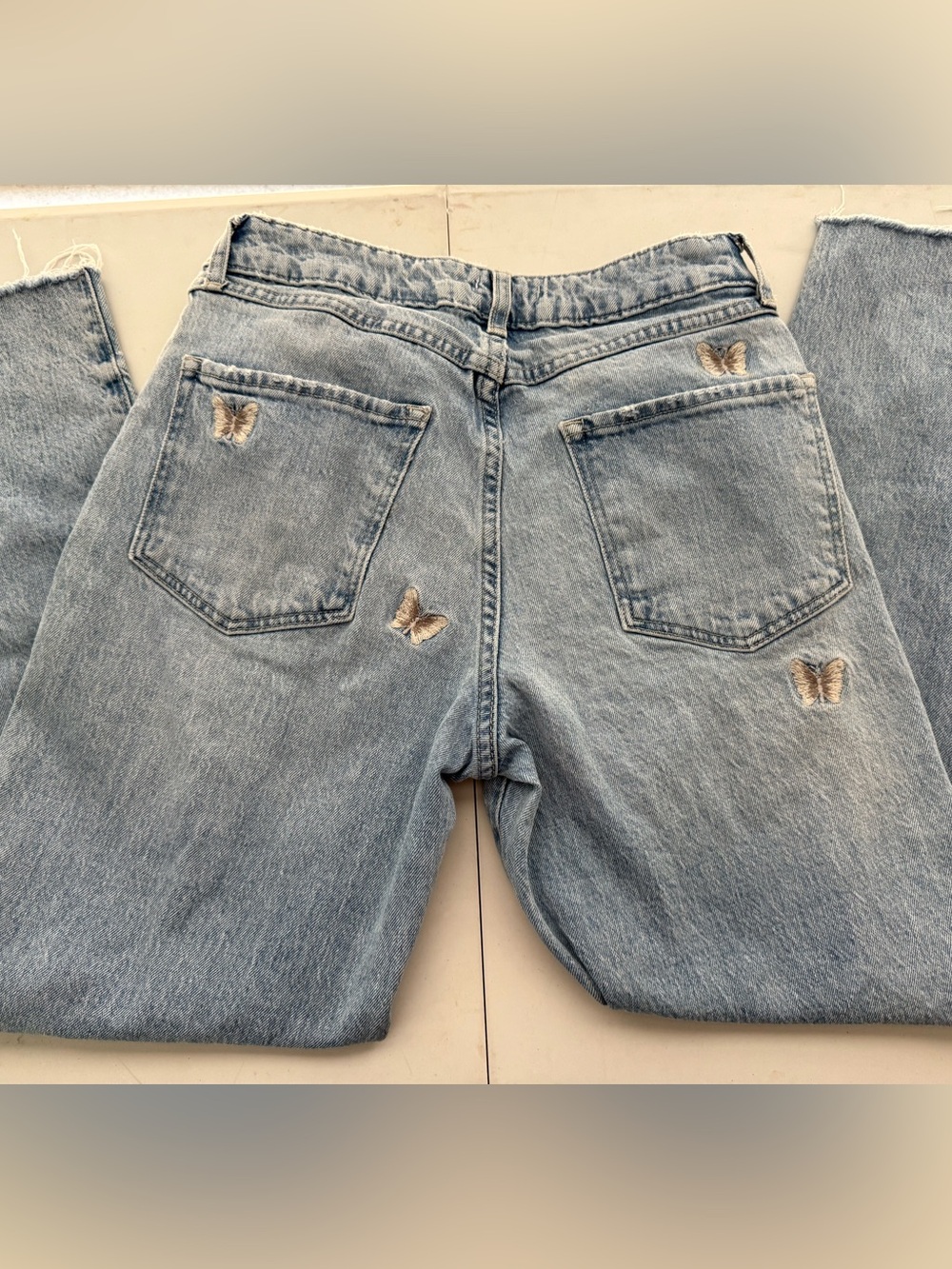 Light Wash Denim Jeans with Embroidered Butterflies